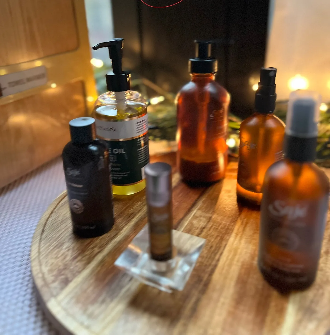 Organic aromatherapy oils on a wooden tray in our studio